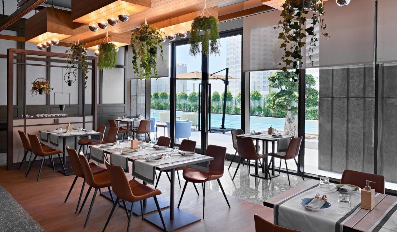 Revier Hotel Dubai Esterno foto